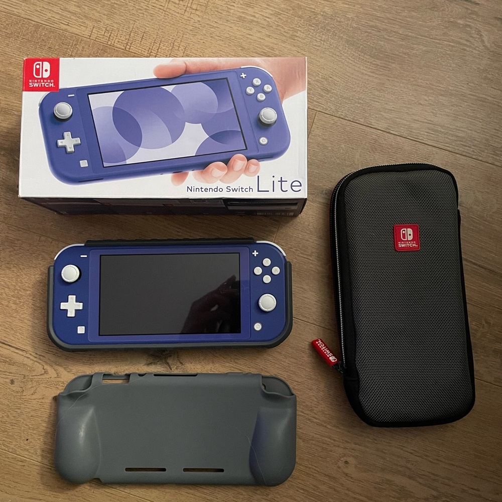 Nintendo switch lite. Game boy blue color. With original box and accessories